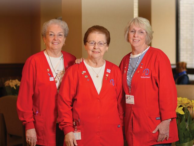 Three woman volunteers